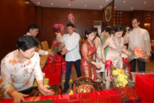 The represntatives of the groom's family fixes the ceremonial table.Photo courtesy of Ms. Zyndee Co The represntatives of the groom's family fixes the ceremonial table.Photo courtesy of Ms. Zyndee Co